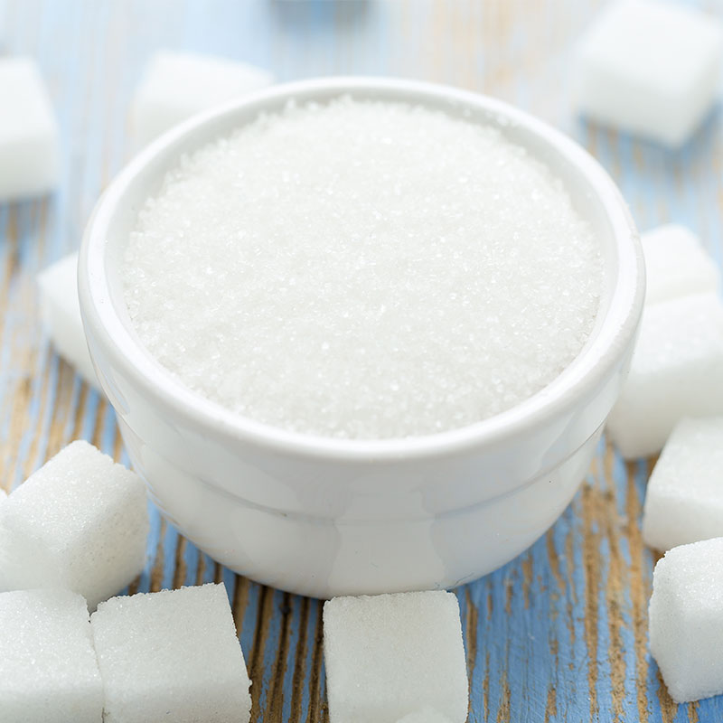 Bowl of sugar with sugar cubes with vending machines